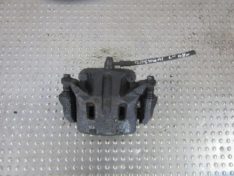 Nissan Qashqai J10 2008 ZACISK HAMULCOWY LEWY PRZÓD