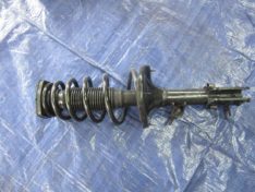 Kia Sportage II 2005 AMORTYZATOR SPRĘŻYNA LEWY TYŁ