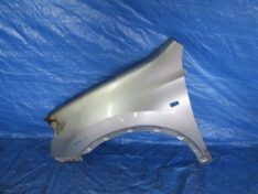 Nissan Qashqai J10 +2 2008 BŁOTNIK LEWY PRZÓD