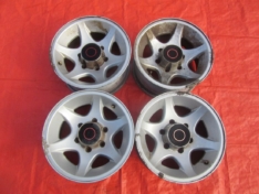 OPEL FRONTERA A FELGI ALUMINIOWE R15 + KAPSLE KPL