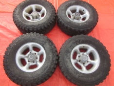 OPEL FRONTERA A KOŁA FELGI ALUMINIOWE R15 + KAPSLE + OPONY CAŁOROCZNE KPL